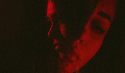 Moody Portraits of a Woman in Neon and Dramatic Lighting – Emotional Expressions in Red, Blue, and Orange Tones