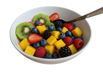 A white bowl filled with a variety of fresh fruits and a silver spoon on the upper right side on transparent background