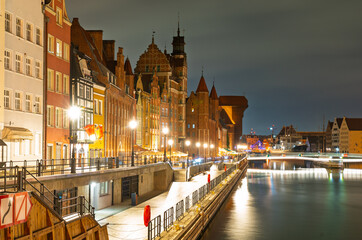 Colorful facades and promenade in Gdańsk Old Town at night © Dreamnordno