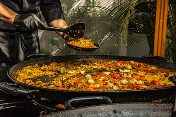 Preparing a delicious seafood paella