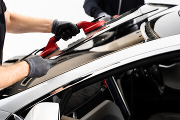 Windshield placement ensures secure seal and integrity. New Windshield installation process....