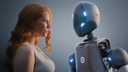 Futuristic Human-Machine Collaboration Concept: Visualization of Young Woman Looking Tenderly at...