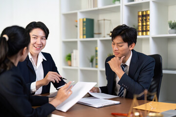 Legal Team Engaging in Productive Discussion in Office
