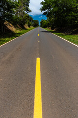 Empty asphalt roadway in rural area in Brazil