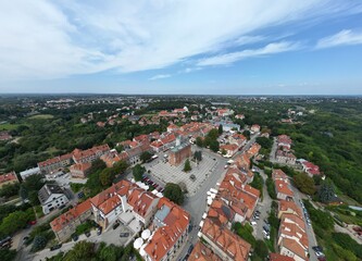 Serene Aerial View of Historic Sandomierz Old Town with RedRoofed Buildings Perfect for Website Banners, Social Media Campaigns and Travel Themed Projects, Inspiring a Sense of Peacefulness.