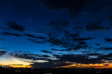 Dramatic sunset in the Sky through cumulus storm clouds,. Awesome epic landscape. Amazing vibrant...