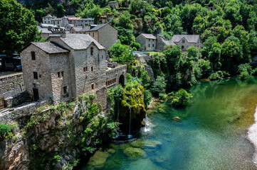 Saint‑Ch&eacute;ly‑du‑Tarn: Riverside Village with Waterfall in the Gorges du Tarn, France