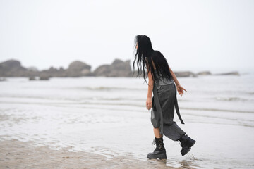 In June 2025, a Korean man and woman in their late fifties are running at full speed along the...