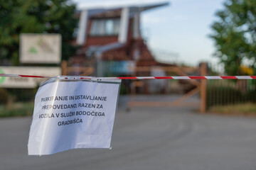 Pribted sign in slovenian prohibiting parking of cars on this parking spot around future athletic centre in ljubljana