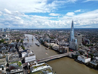 Financial and business centre. Financial capital of the world. Skyscrapers. City of London—global financial centre. The Shard. Tower Bridge.