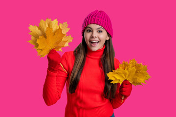 Stylish girl hold maple leaves. Fall season. Hello autumn. Carefree teen girl in hat and gloves isolated on pink. Autumn foliage. Autumn and leisure. Fall leaves and beautiful girl. Golden leaves