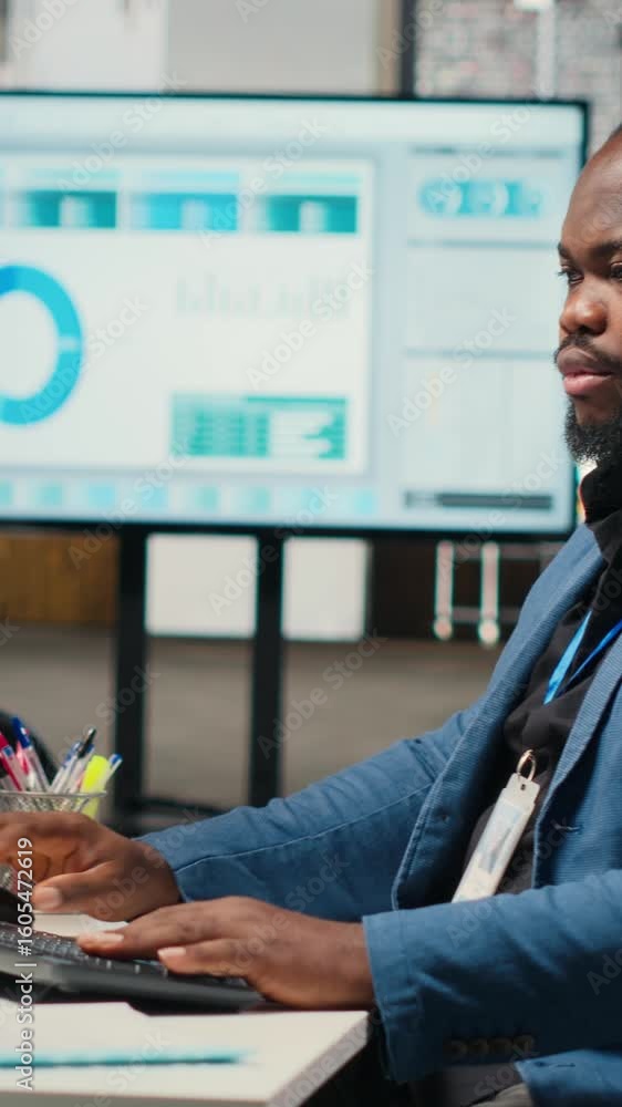 Poster vertical video black engineer uses artificial intelligence systems for automation and data mining, e