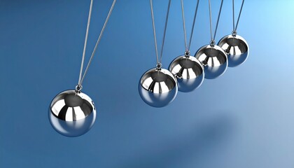 Newton's cradle illustrating the laws of motion and energy conservation, symbolizing cause and effect, decision-making or ripple effect in business or science