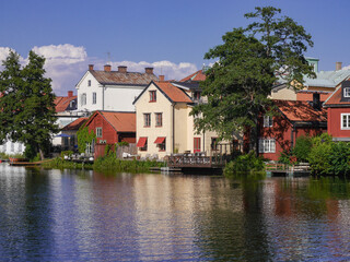 Obraz premium Buildings at a river in Eskilstuna