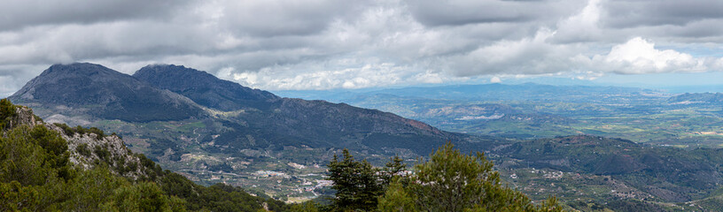 Panoramic view on Yunquera and surrunding pine forest from Puerto Saucillo viewpoint, Sierra de las Nieves national park, Andalusia, Spain