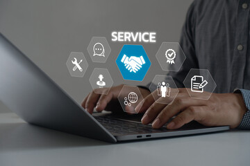 Technical support operator with virtual screen icon working on laptop computer. Help desk IT support call center online technology. Customer service and business warranty quality assurance concept.