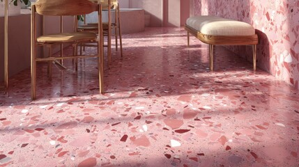 Interior room with pink terrazzo flooring and walls, featuring wooden chairs and a bench, creating a stylish and contemporary design.