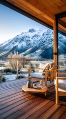 Cozy wooden deck with modern furniture, overlooking majestic snow-capped mountains, creating a serene outdoor retreat with natural beauty and tranquility