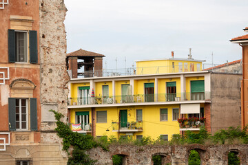 Exterior view of buildings of various ages in Pisa, Italy