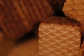 Close up texture of cube wafer biscuit with layer of hazelnut