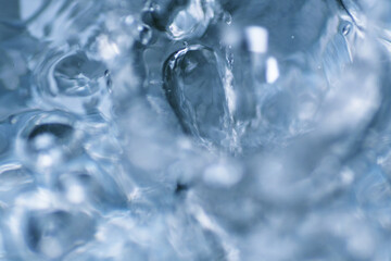 Macro shot of water. It is transparent, tasteless and odorless