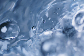 Macro shot of water. It is transparent, tasteless and odorless