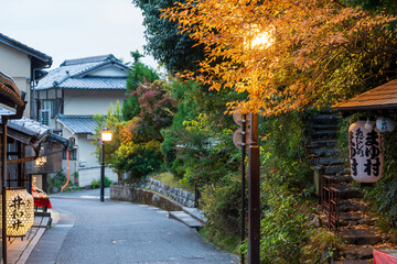 kyoto, Japan - November 22, 2024 : The historic streetscape of Saga-Toriimoto, a preserved district...