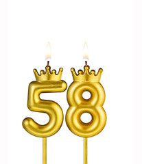 Golden number 58 birthday candle on white background