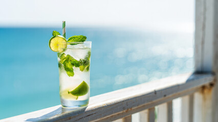 Beach cocktail, hugo spritz, summer drink, mint and lime, elderflower refreshment, seaside beverage, tropical alcohol, low ABV cocktail, chilled glass, vacation mood