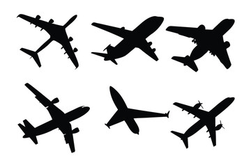 Silhouette Airplanes: Overhead shot features an arrangement of diverse passenger airplane silhouettes, each in mid-flight, perfect for travel and aviation concepts.