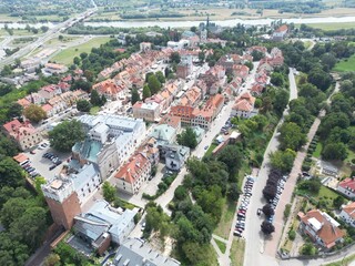 Breathtaking Aerial View of Historic Sandomierz Old Town with River and Road, Ideal for Travel and Landmark Promotions Evokes a Sense of Timeless Charm.