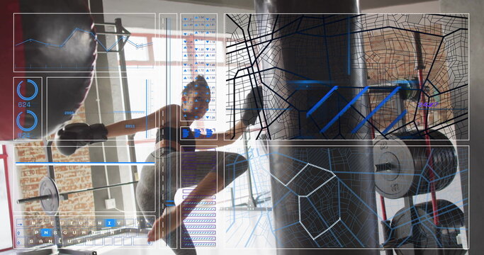 Kicking punching bag, female athlete in sports bra, leggings at gym studio, with tracking overlay