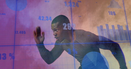 Capturing male athlete sprinting in studio wearing sportswear, with floating data charts and graphs