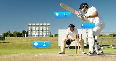 Two cricketers in white uniforms holding bat by stumps on pitch, with social icons, copy space