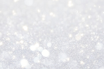 Shiny silver background with sparkling glitter, bokeh effect