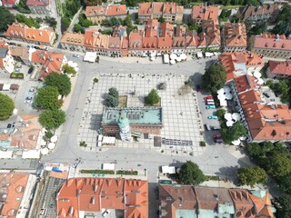 Stunning Aerial View of Sandomierz Historic Old Town with Grand Fountain Ideal for Travel and Historical Projects, Inspires Wanderlust and Nostalgia.