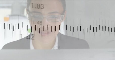 Woman opening laptop, viewing transparent overlay charts pulsing while analyzing financial data - Powered by Adobe