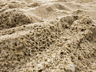 Wet sand rain on beach texture