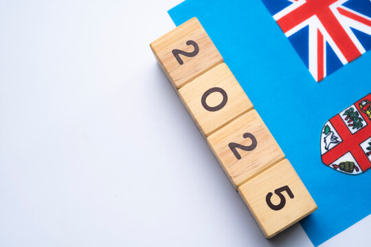 2025, Fiji flag with date block, Concept, Important events for Fiji the new year, election, economy, social activities, central bank, Fiji foreign policy - Powered by Adobe