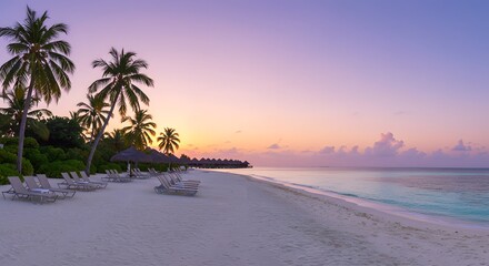 Fototapeta premium Maldives Paradise Beach: A serene paradise unfolds at sunset, where the gentle caress of the turquoise ocean meets the soft embrace of the sandy shore.