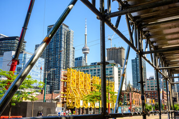 Urban Construction Framed by Scaffolding in Downtown Toronto on a Summer Day