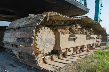 Steel wheel rails for heavy equipment vehicles