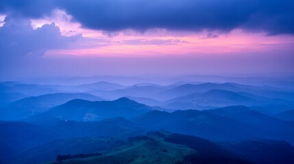 Obraz premium Mountain landscape bathed in twilight hues of deep blue and fading sunset colors. 