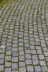 Abstract texture background of of a cobblestone walking path made of blue and gray natural granite...