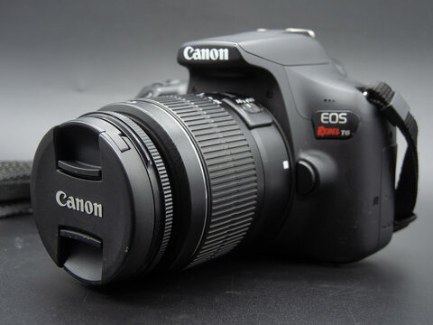 Zapopan Jalisco, Mexico - July 23, 2025: Canon EOS Rebel T6 DSLR reflex camera with lens cap, camera concept