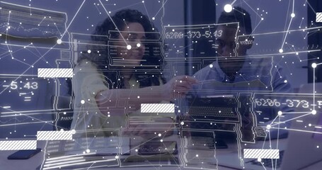 Woman pointing at tablet graph causing data overlay while man typing guiding business analysis - Powered by Adobe