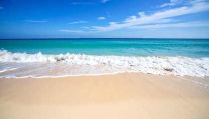 Serene seascape with gentle waves lapping against a pristine sandy beach under a blue sky