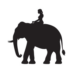 Silhouette of a Person Riding an Elephant 