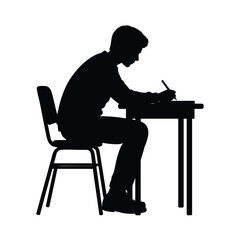 Silhouette of a Person Writing at a Desk