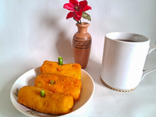 Risoles, or risol, is a pastry filled with eggs and vegetables wrapped in an omelette, and fried after being coated with breadcrumbs and beaten chicken eggs.
